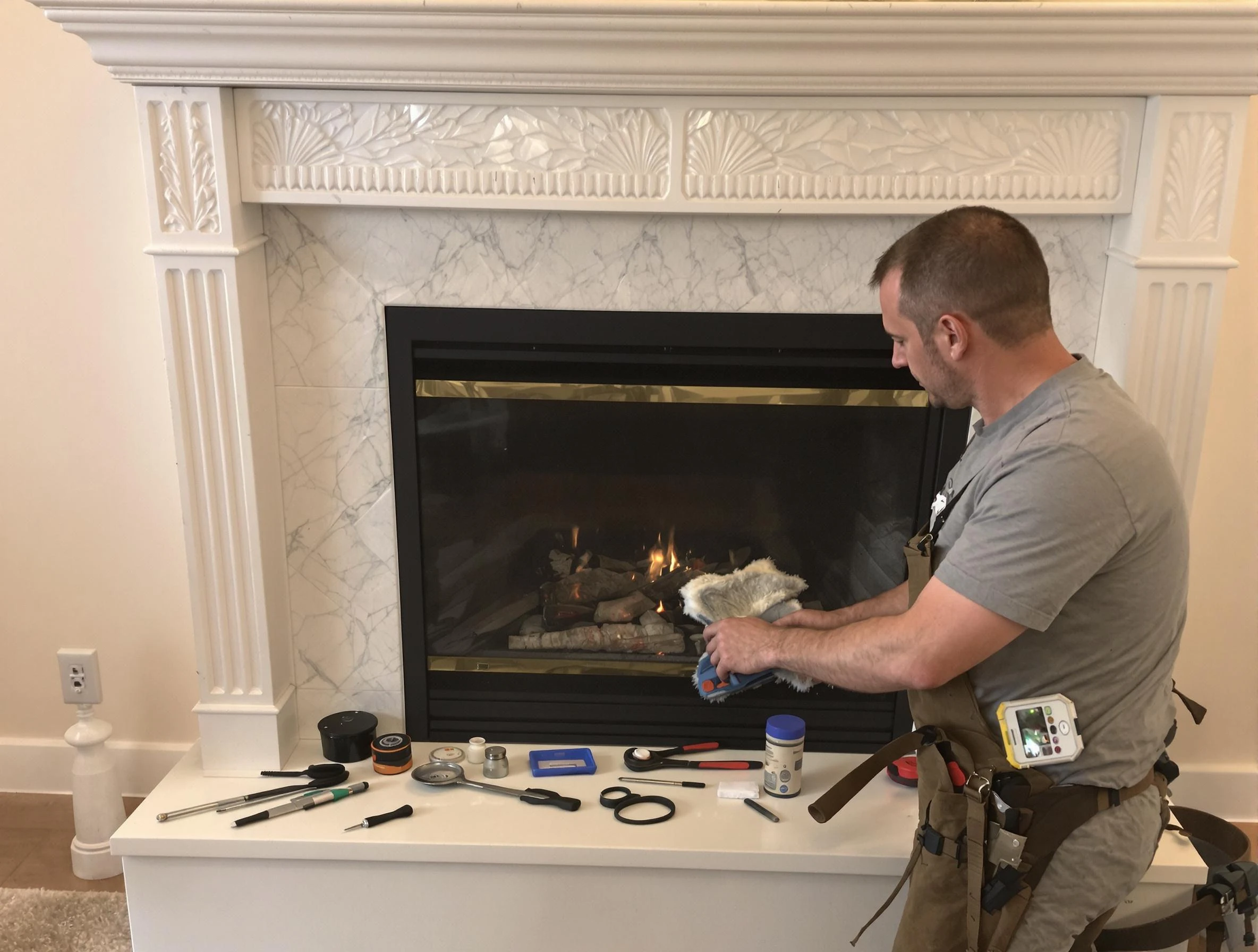 Marshfield Chimney Sweep performing fireplace maintenance in Marshfield, MA
